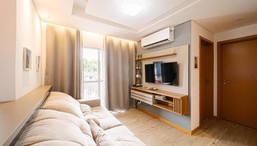 Aconchego e privacidade para sua família com 2 quartos, sala e cozinha integrados e sacada com churrasqueira - Foto 3