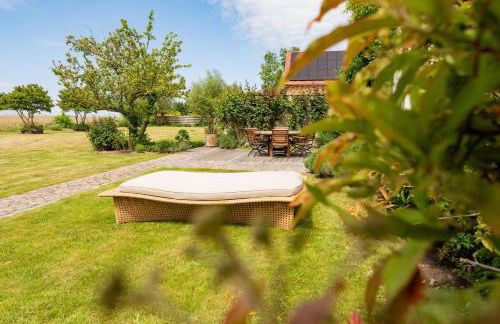 Ferienhaus Peeneblick - exklusives Traumhaus in Direktlage am Wasser mit Bootssteg und Aussensauna - Foto 41