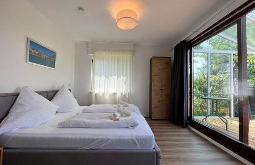 Ferienhaus Wellnesshütte mit Außenwhirlpool und herrlichem See-und Alpenblick - Foto 7