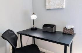 Poolside 2BR Condo with Balcony & Workspace - Photo 24