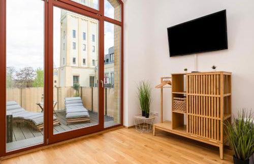 mayhome - das STRANDLOFT schönes Studioapartment mit Balkon, Küche und Tiefgarage - Sauna und Fitness direkt nebenan - Foto 23