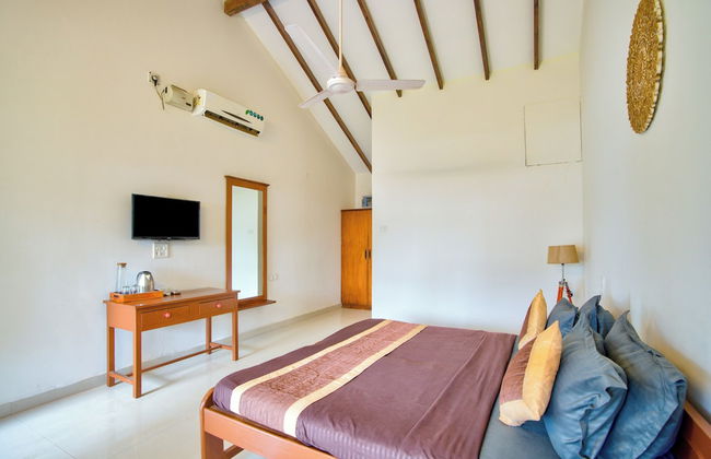 Papilio Beach Front Cottages - Photo 13