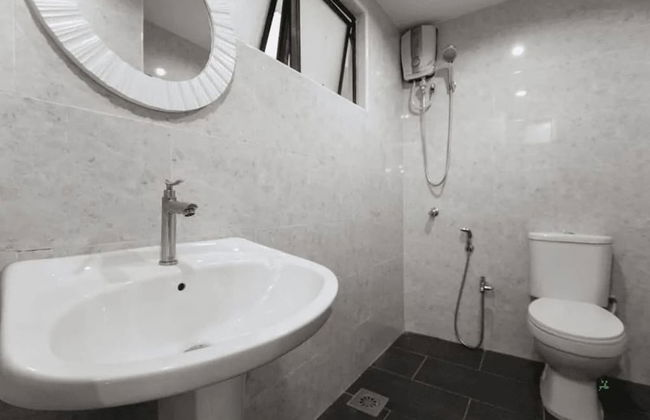 Desa Kiara Cozy Condo by SYNC - Photo 23