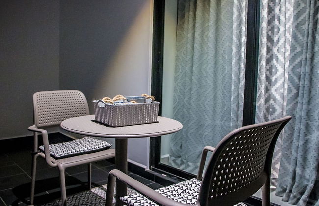 Embassy Gardens Premier Suites - Photo 50