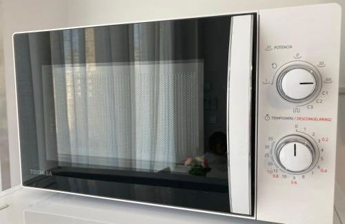 La Manga km 0, pisos estudios - planta baja - 100m de la playa - studio flats - ground floor - 100m from the beach, cada con bicis & tabla SUP, piscina & pádel & tenis & más - each with bikes & SUP board, pool & paddle & tennis & more - Foto 19