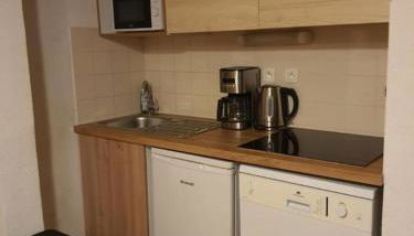 Chamrousse 1700 - Asters A03 - Rez de Jardin, Piscine, Sauna, Terrasse plein sud - Foto 3, stove, minibar