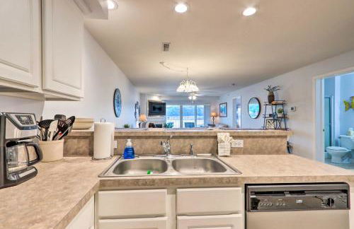 Breezy Lakefront Condo with Balcony and Lake View! - Photo 11