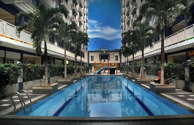 Queen Room 2 @ Grand Center Point Apartment - Photo 1