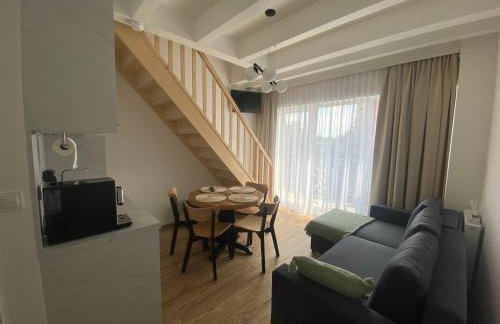 SOLEK, Apartamenty hotelowe i pokoje gościnne ze śniadaniem, przyjazne zwierzętom, wyjątkowe, z widokiem na Jezioro Jamno i w bardzo bliskiej odległości od morza - Foto 28