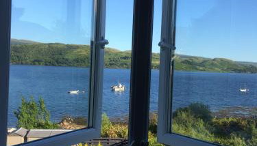 Tigh Na Mara - Foto 1