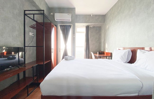 Homey And Good Choice Studio At Amartha View Apartment - Photo 1