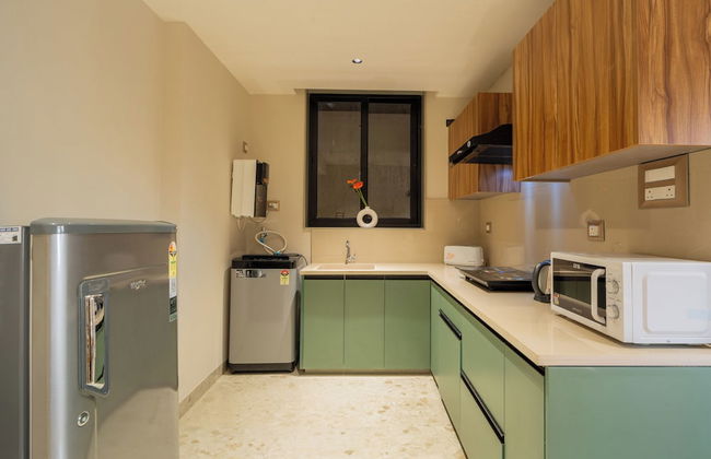 ELIVAAS Kamerios Verano 1 BHK with Pool - Photo 15