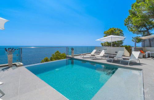 Can Ema, villa moderna con piscina frente al mar - Foto 19