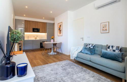 Sleek & Modern Flat w/ Private Garage by HostWise - Photo 1