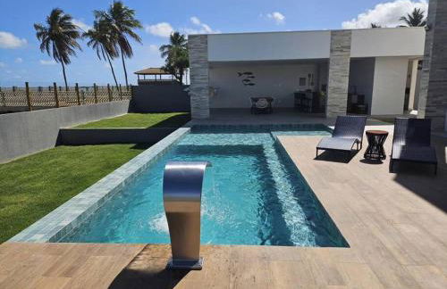 Piscina aquecida, 5 suítes e pé na areia com vista espetacular!! - Photo 29