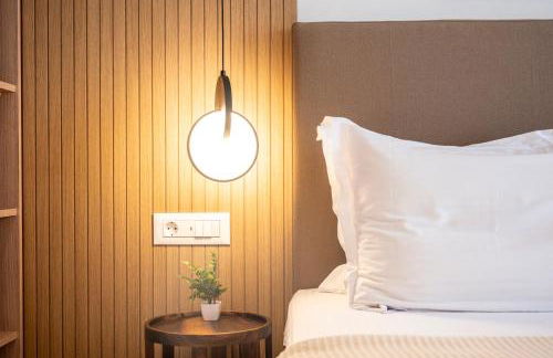 Unicos City Suites - Photo 16