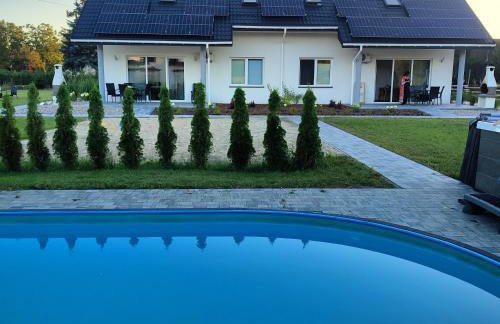 Apartamenty Wilga - spokojne miejsce z całorocznym zewnętrznym wspólnym jacuzzi, sauną i letnim basenem - Foto 5