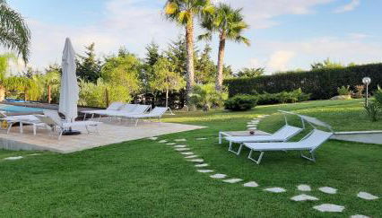 Isola del sole, Appartamenti con piscina - Foto 4, Garden, sunbed, Garden view