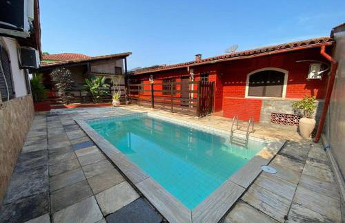 Ampla casa em condomínio a 300mt da praia - Foto 19