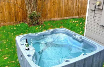 Comfy 5BR Holiday Home with Hot Tub, 10min from NGR Stadium - Foto 32