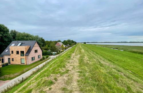 Deichkoje12 Deck 1 EG direkt am Eiderdeich nur 7 km bis zur Nordsee und 20 Min bis Sankt Peter Ording - Foto 2