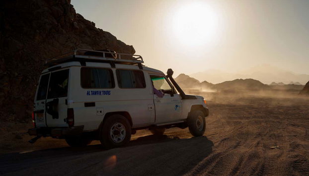 4x4 desert tour at sunset
