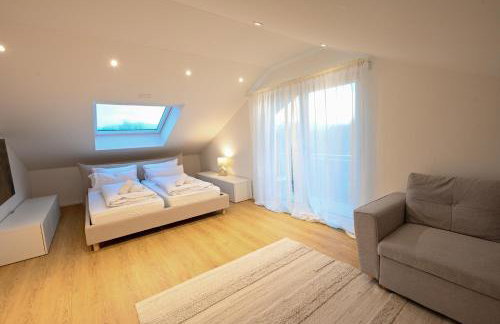 Liboria I Stylische Maisonette Wohnung Alpenblick I 4min zum See - Foto 44