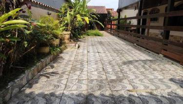 Ampla casa em condomínio a 300mt da praia - Foto 2