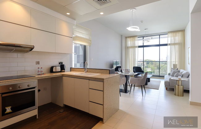 WelHome - Prime 1BR Apartment at Oia Residence - Photo 11