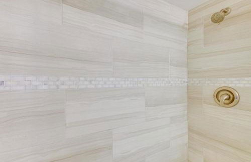 Coastal Condo Escape with Patio Steps to Beach - Photo 16