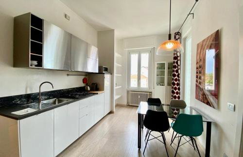 GuestHost - Piazzale Susa Bright Flat con Veranda - Foto 1