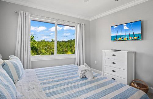 NEW!Paradise PalmsDockPoolKayaks GrillView! - Foto 12