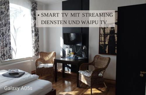 Haus Krabbe Zimmer ohne Küche, zentral gelegen zwischen Cuxhaven und Bremerhaven, Unterstellmöglichkeit für Fahrräder und E-Bikes, hauseigener Parkplatz, Hunde kostenfrei willkommen - Foto 19