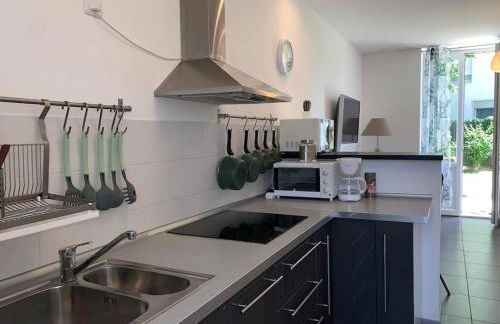 HOMEYPIC T3 en rez de jardin proche de Lyon - Foto 4