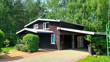 Dom letniskowy przy lesie nad jeziorem - Foto 1