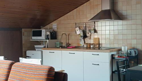 La mansarda - Photo 3, stove