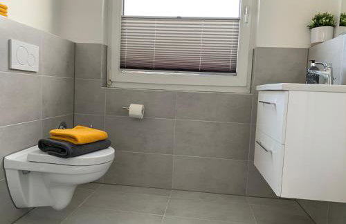 FEDDERSEN LIVING Moderne Ferienwohnungen - Gemütlich - Netflix - Voll ausgestattet - Waschmaschine - zentral gelegen - Foto 12