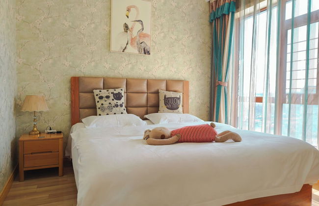 Dalian Bo Ke Business Apartment - Foto 33