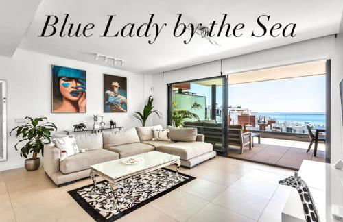 Blue Lady by the Sea - Photo 1