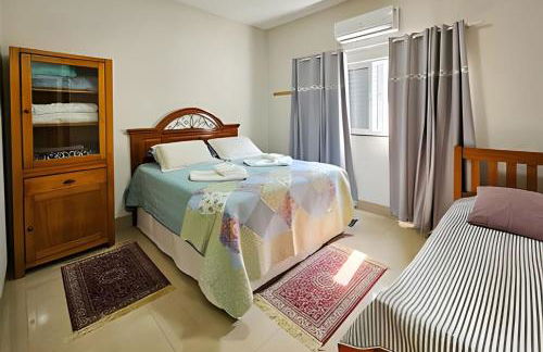 Casa ampla e confortável. Piscina e churrasqueira. - Foto 31