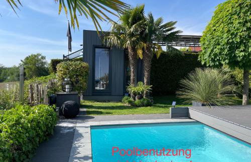 TINY-HOUSE mit Alpen- Stadt- und Poolblick , WLAN - Foto 1