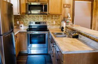 Rustic Chic Alabama Cabin w Loft Fire Pit Pet Friendly Fenced Yard Lake Guntersville - Coco Chateau - Foto 24