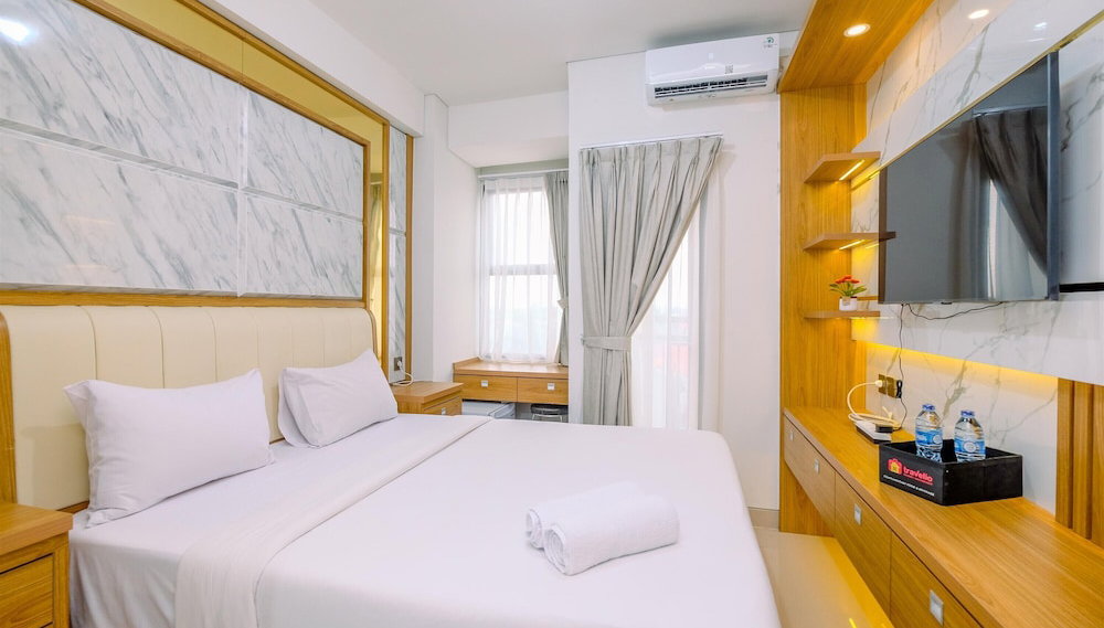 Cozy And Homey Studio Room Transpark Cibubur Apartment - Foto 1, Imagen principal