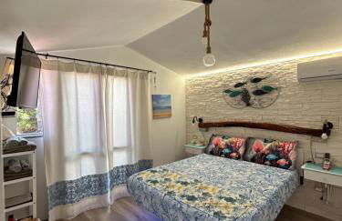 Oasi del Relax - Seaside Peaceful Panoramic Terrace in ITALY - new Sardinia apartment 50 mt beach&sea full comfort air conditioning-WiFi-Parking-Privacy - Foto 9