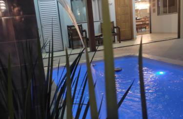 ESPAÇO PÉROLA GUANABARA, 70 Metros do Mar, 4 Suítes independentes COM AR, Área Gourmet Integrada com Piscina,Churrasqueira, 900 Metros de CASTELHANOS, ideal para FAMÍLIAS E AMIGOS - Foto 67