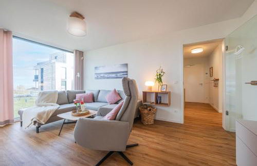 Hygge – Familienfreundliche Ferienwohnung mit Garten & Meerblick - Foto 15