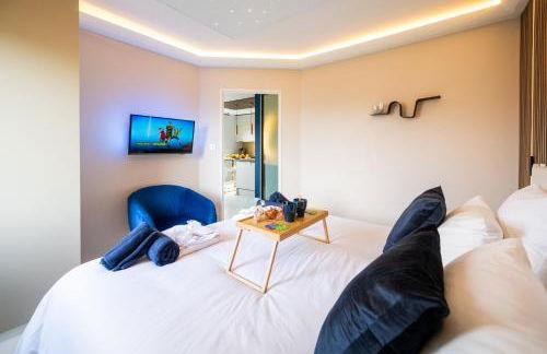 L'Escapade Indigo - Balnéo - Sauna - Foto 17