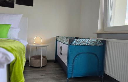 HAPPY HOMES FUN - Dein Erlebnis-Apartment für Gamer, Helden & große Kinder - Parkplatz - PS5 - WLAN - Foto 7