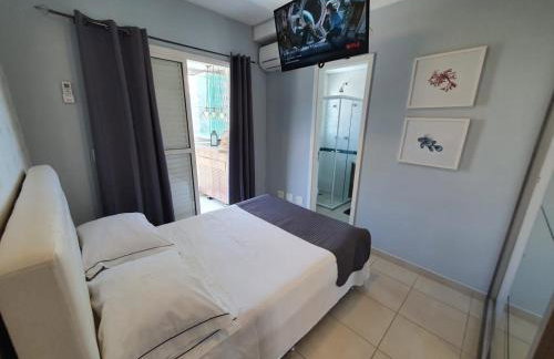 Home Ap Cinema Frente Mar em Bertioga - Photo 2