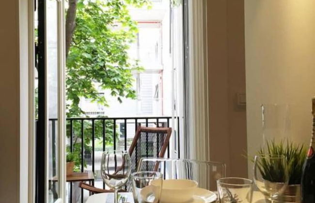 StayPlus Central Apt Balcony - Photo 1